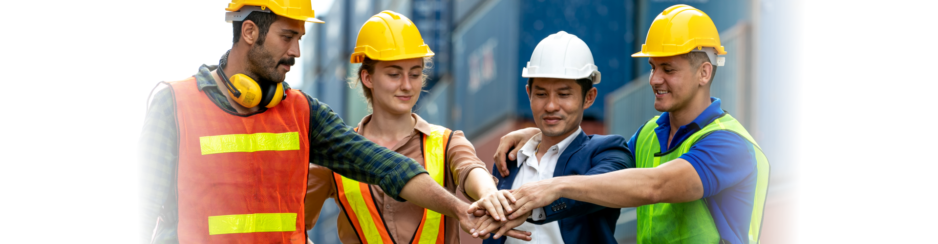 group of professional people stacking hands